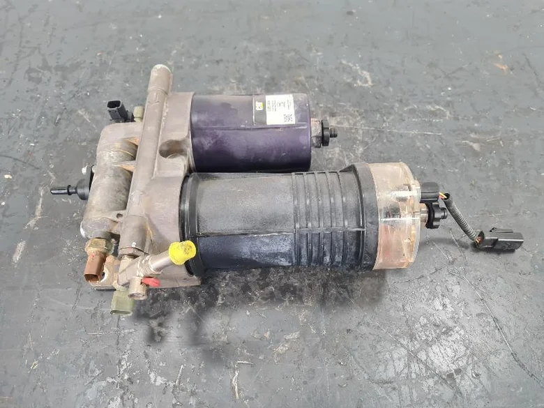 SUPPORT + FILTRE SEPARATEUR EAU/CARB.